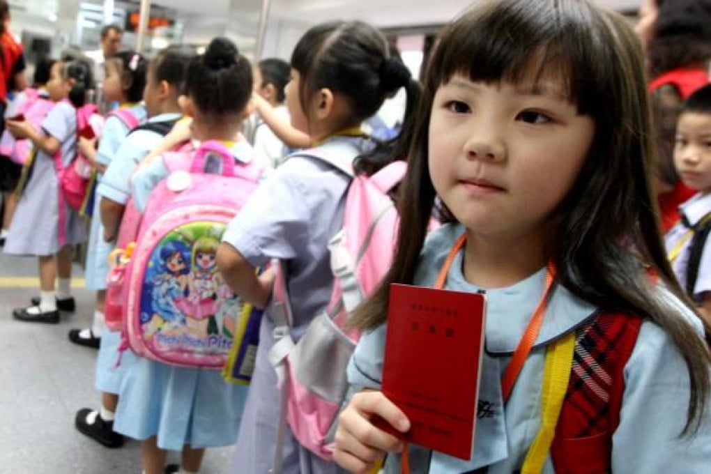 Students from mainland cross the border in Lo Wu to go to school in Hong Kong.
