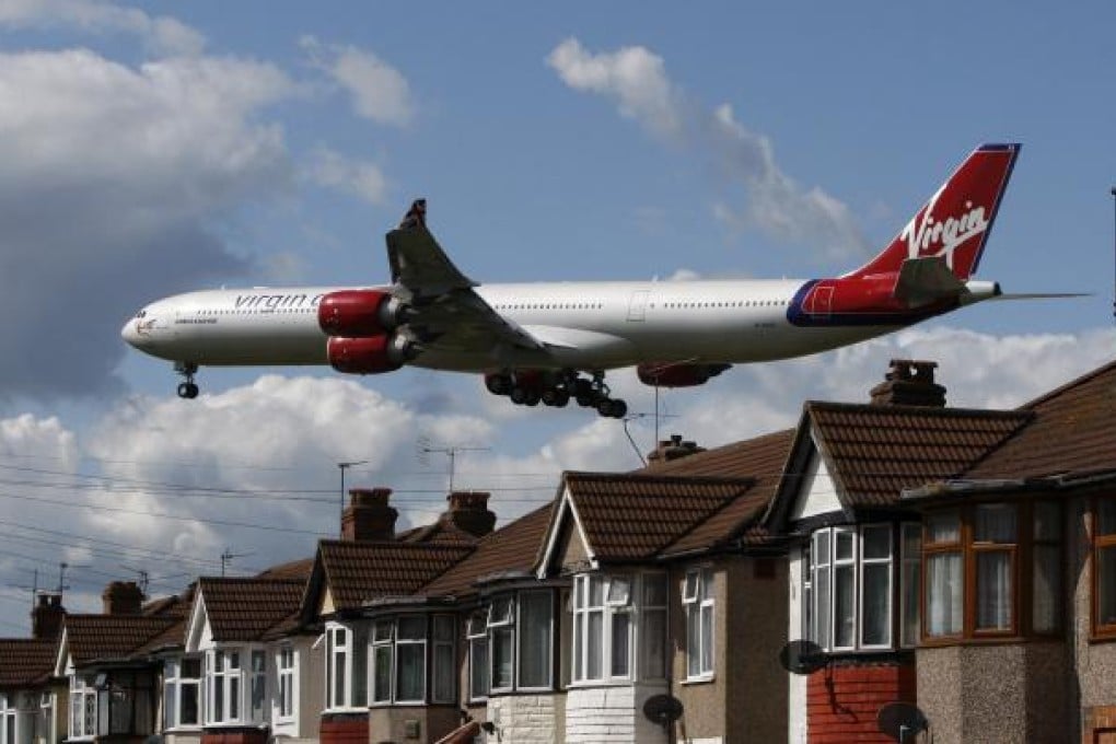 A Virgin Atlantic aircraft comes in to land at Heathrow Airport. Singapore Airlines is talking about selling its 49 per cent stake in the airline and Delta Air Lines is said to be a potential buyer. Photo: Reuters