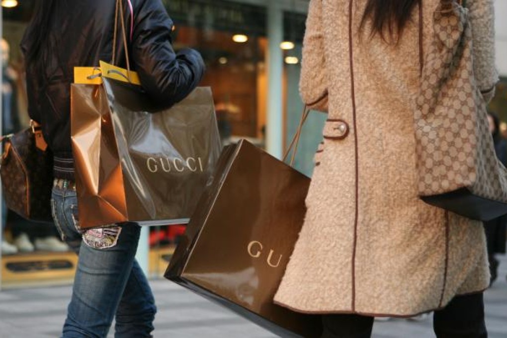 Chinese consumers are more willing to splash out on big-ticket items. Photo: Bloomberg