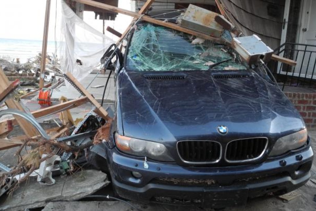 Carmakers are experiencing a spike in car orders in the wake of Hurricane Sandy, which hit the East Coast in October, as people replace wrecked vehicles. Photo: AFP