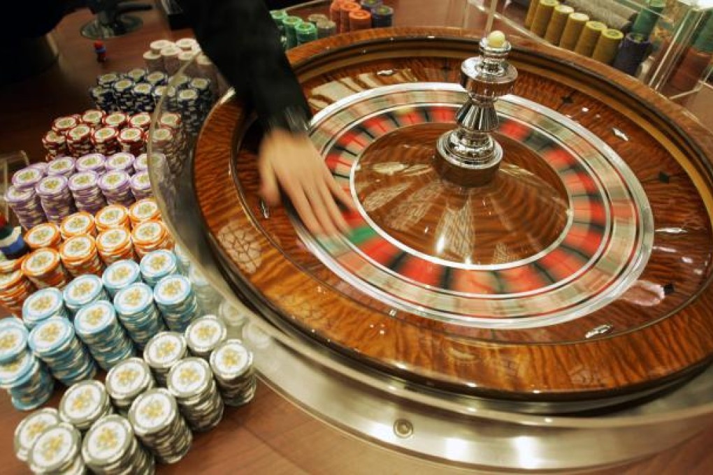 SJM leads casinos' slide on junket curb worries