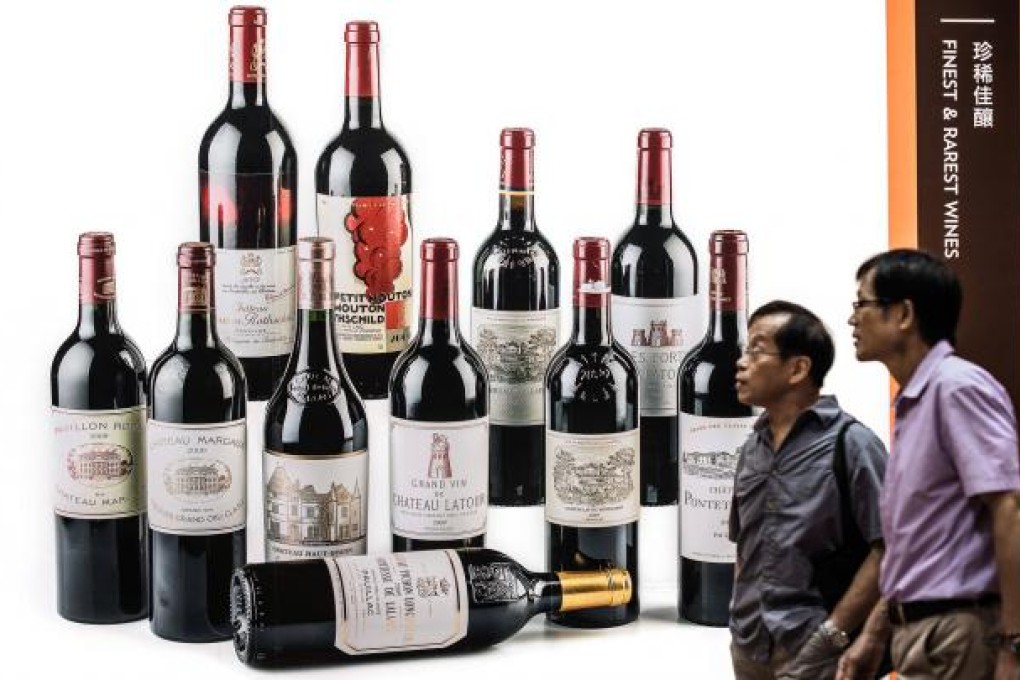 A billboard displays premium wine lots at Sotheby's autumn sales in Hong Kong in October. Photo: SCMP