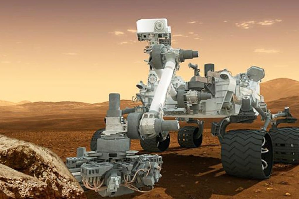 An artist's rendering of the Curiosity rover on the surface of Mars. Photo: AP/Nasa