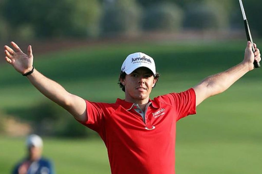 Rory McIlroy of Northern Ireland celebrates after winning the final round of Dubai Golf World Championship at Jumeirah Golf Estates in Dubai in November. Photo: EPA