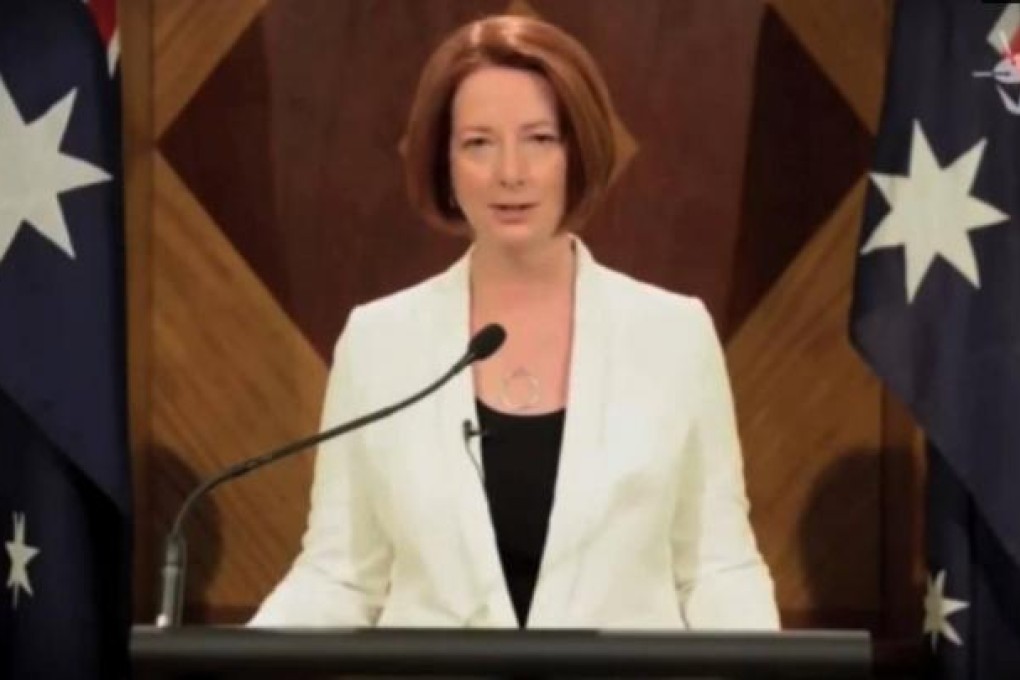 Julia Gillard tells Australians she will carry on fighting, be it against flesh-eating zombies or Korean pop. Photo: SCMP