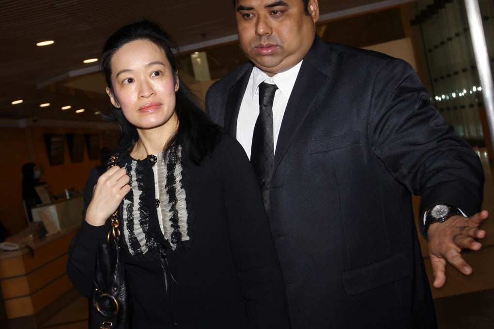 Florence Tsang, ex-wife of billionaire Samuel Lee Tak-yee's son, leaves court. Photo: Edward Wong