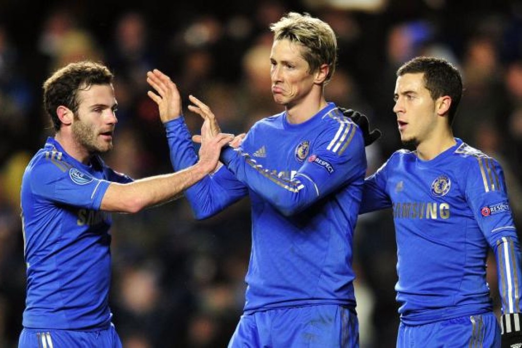 Chelsea's Fernando Torres celebrates after scoring his second goal of the night. Photo: AFP