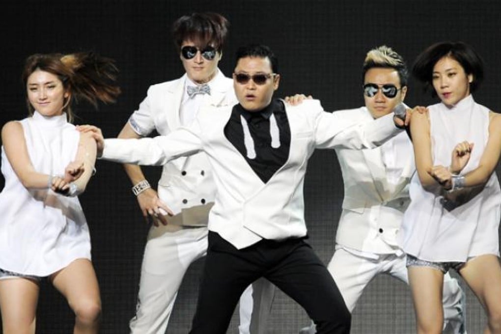 Psy (centre) performs with backup dancers during the second night of KIIS FM's Jingle Ball at Nokia Theatre LA Live on Monday in Los Angeles. Photo: AP