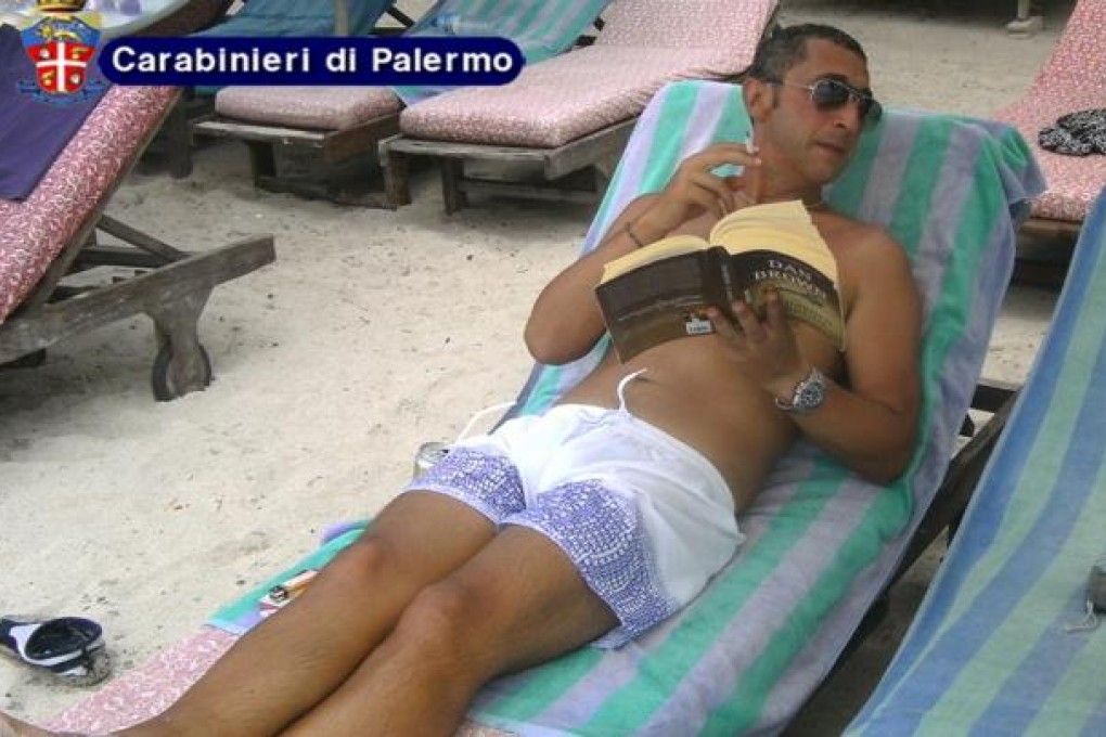 Italian mafia boss Antonino Vitale sunbathes in Bali. Photo: AFP