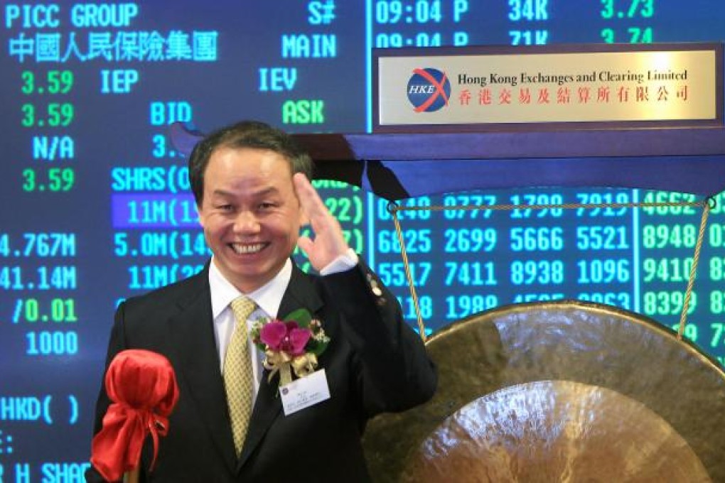 PICC chairman Wu Yan at the listing ceremony. His company raised eyebrows with a strong trading debut. Photo: Jonathan Wong
