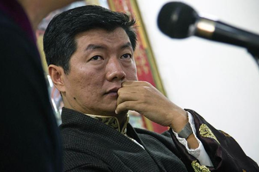 Lobsang Sangay, prime minister of the Tibetan government-in-exile, attends a press conference in Dharmasala, India. Photo: AP