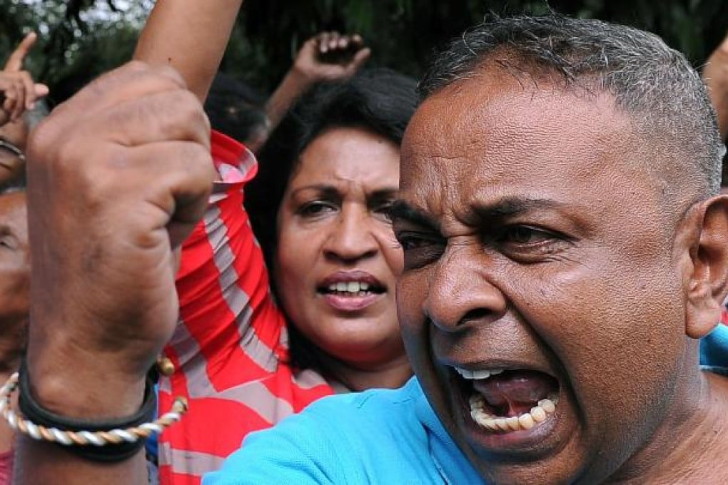 Sri Lankan activists staged a protest against Chief Justice Shirani Bandaranayake. Photo: AFP