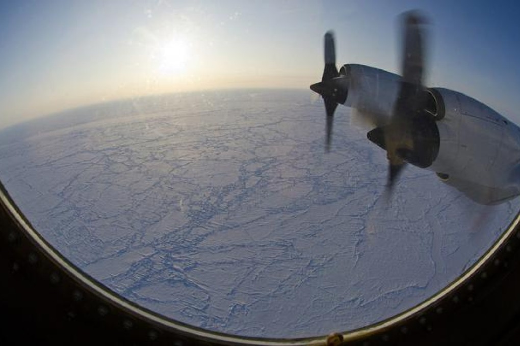 A UN report says the ice area around the North Pole shrunk to 3.41 million square kilometres in September, 18 per cent less than the previous low in 2007. Photo: EPA