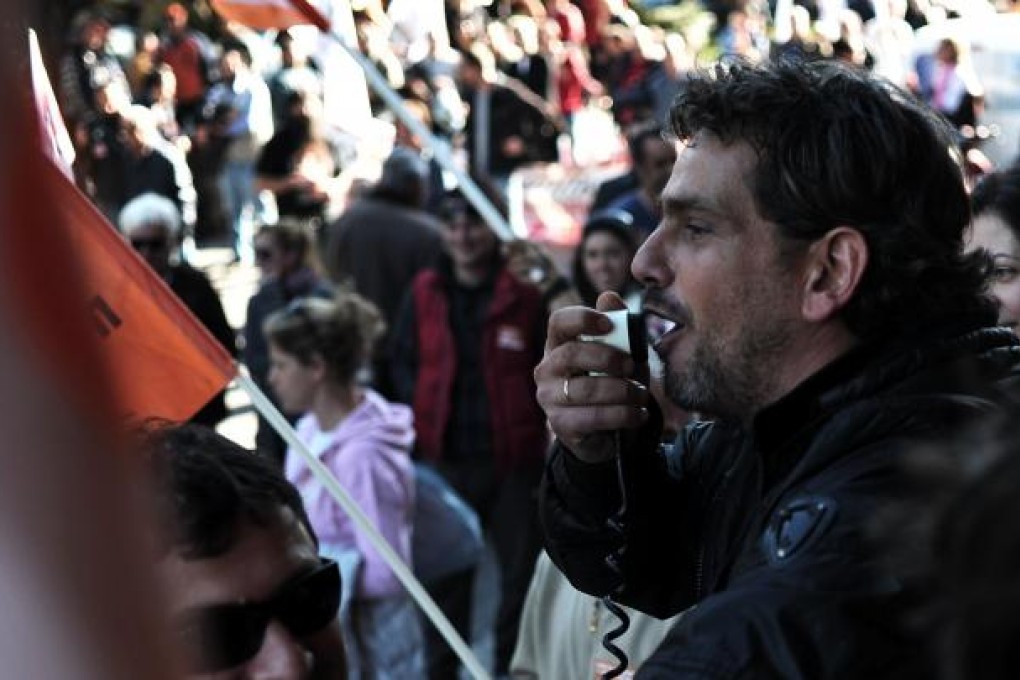 Greeks protest against cuts and expected lay-offs. Photo: AFP