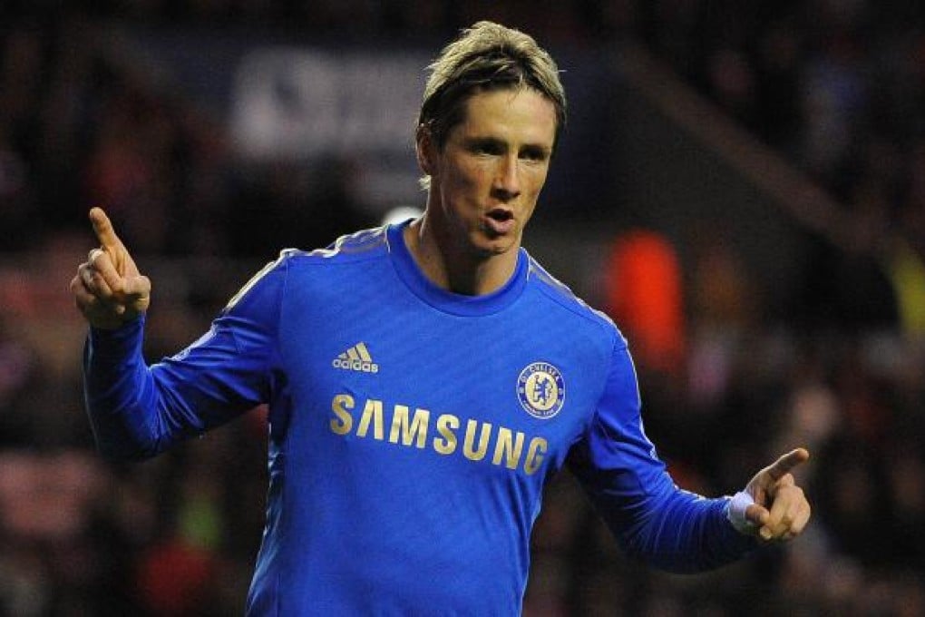 Chelsea's Fernando Torres celebrates after scoring a penalty for his second goal against Sunderland. Photo: AFP