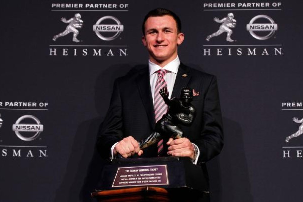 Texas A&M's Johnny Manziel is the first freshman to win the coveted Heisman Trophy. Photo: AFP