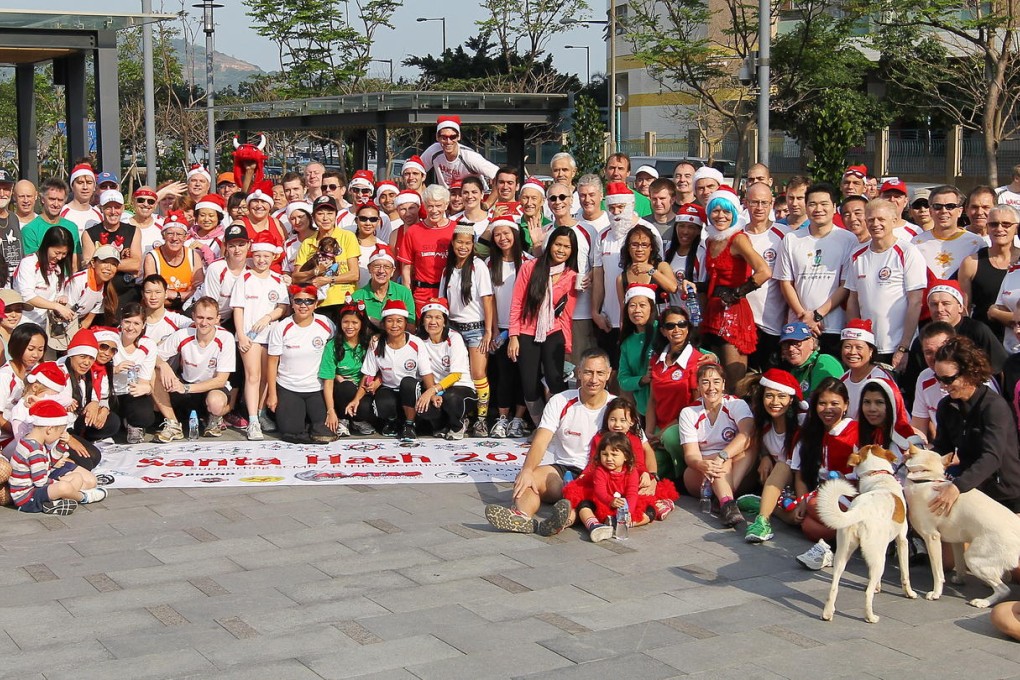 Santa Hash participants at Aldrich Bay park in Shau Kei Wan before the start of the 25th anniversary run on Sunday. Photo: Edmond So