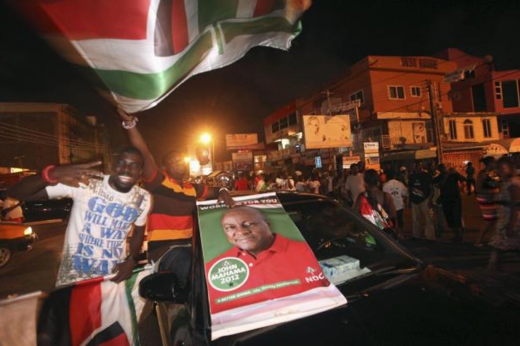 NDC supporters celebrate on Accra streets. Photo: Reuters