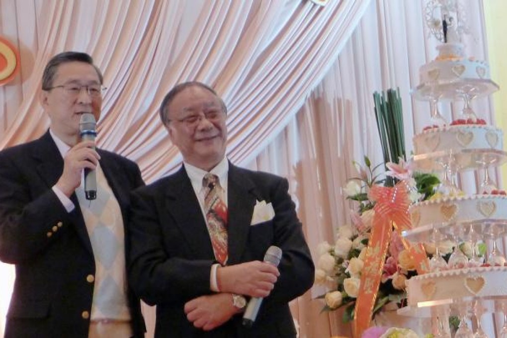 Paul Chow, former chief executive of Hong Kong Exchanges and Clearing (left), with veteran broker Cheung Tin-sang. Photo: Enoch Yiu