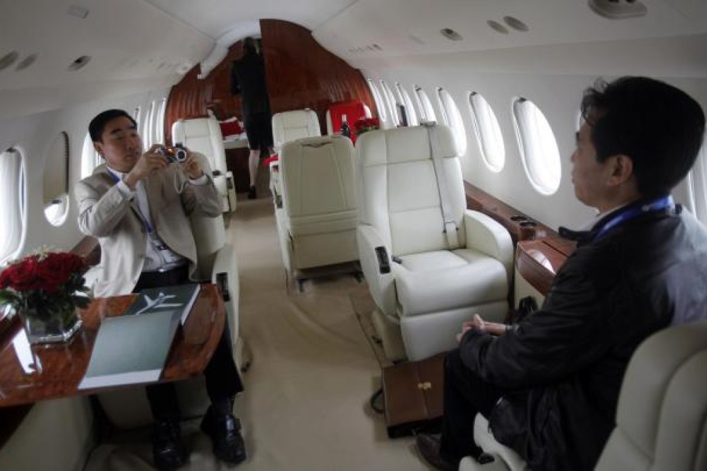 American International Group is selling its stake in ILFC to raise cash to help repay US bailout money. Photo: Reuters