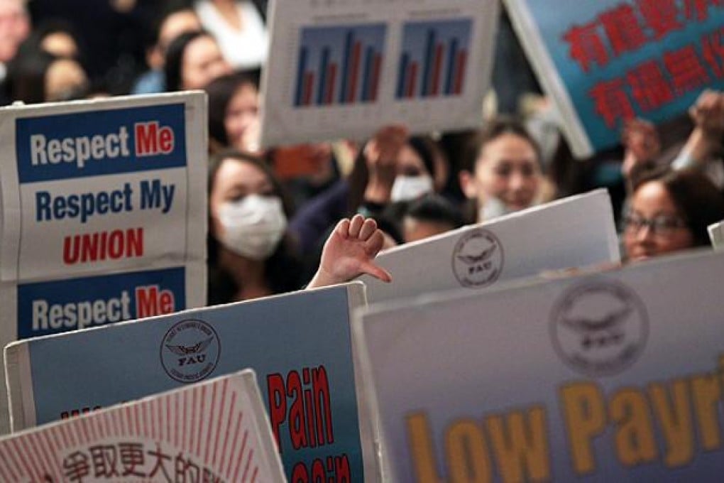 Cathay flight attendants' union discuss possible industrial action at a special meeting at the Regal Airport Hotel. Photo: K. Y. Cheng