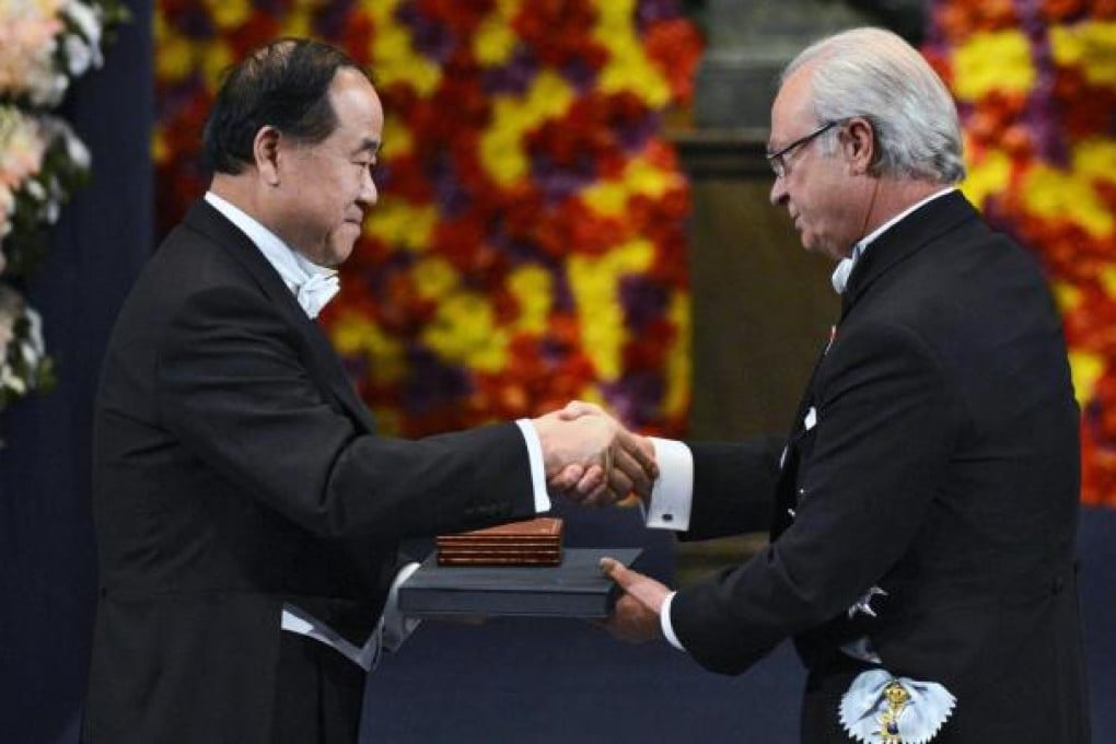 Mo Yan receives his Nobel Prize from Sweden's King Carl Gustaf in Stockholm last night. Photo: EPA