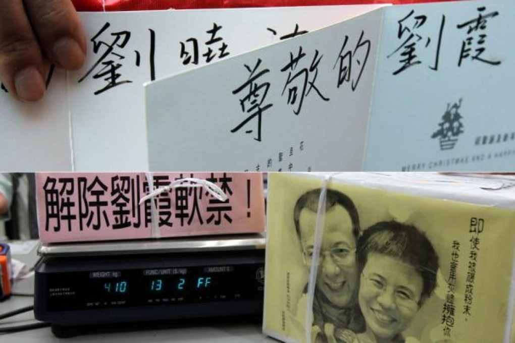 Hong Kong activists send Christmas cards to laureate Liu Xiaobo and his wife Liu Xia. Photos: K.Y. Cheng