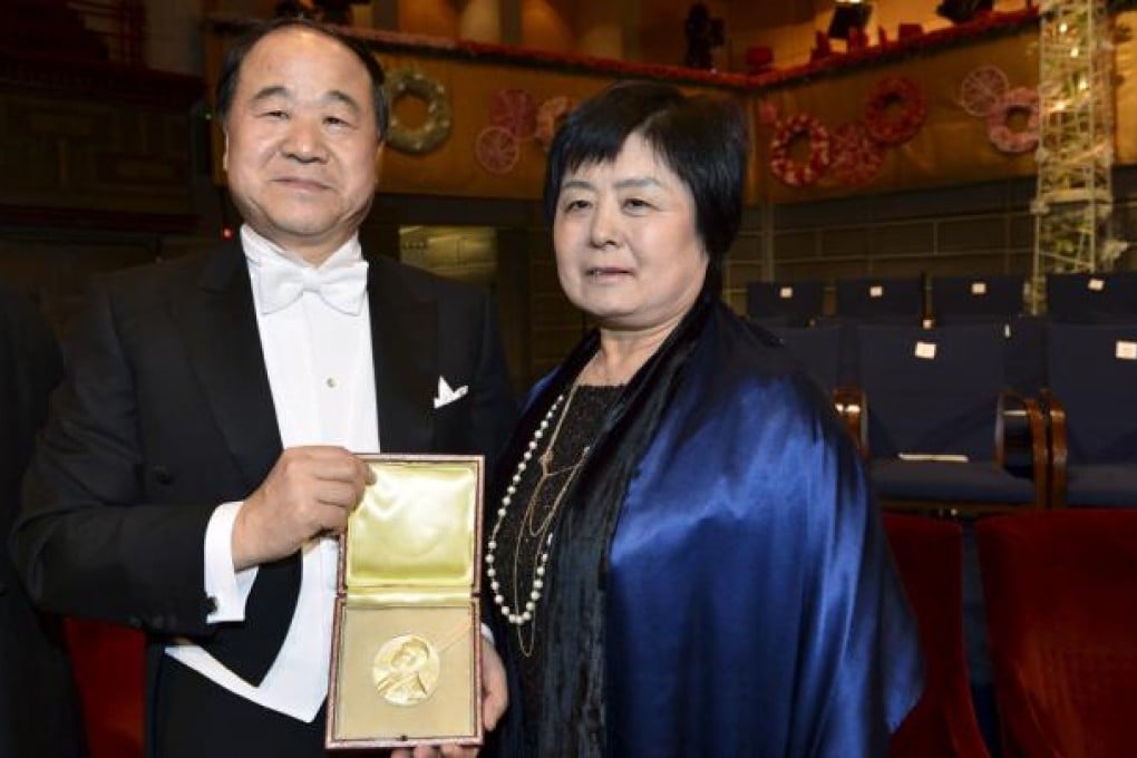 Mo Yan with his wife Qinlan Du at the ceremony. Photo: EPA