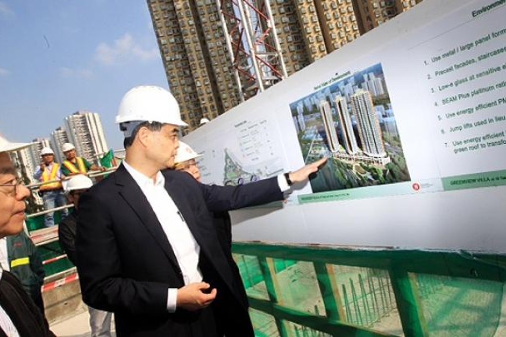 CY Leung visits the Greenview Villa housing project in Cho Yiu Chuen, Tsing Yi. Photo: David Wong