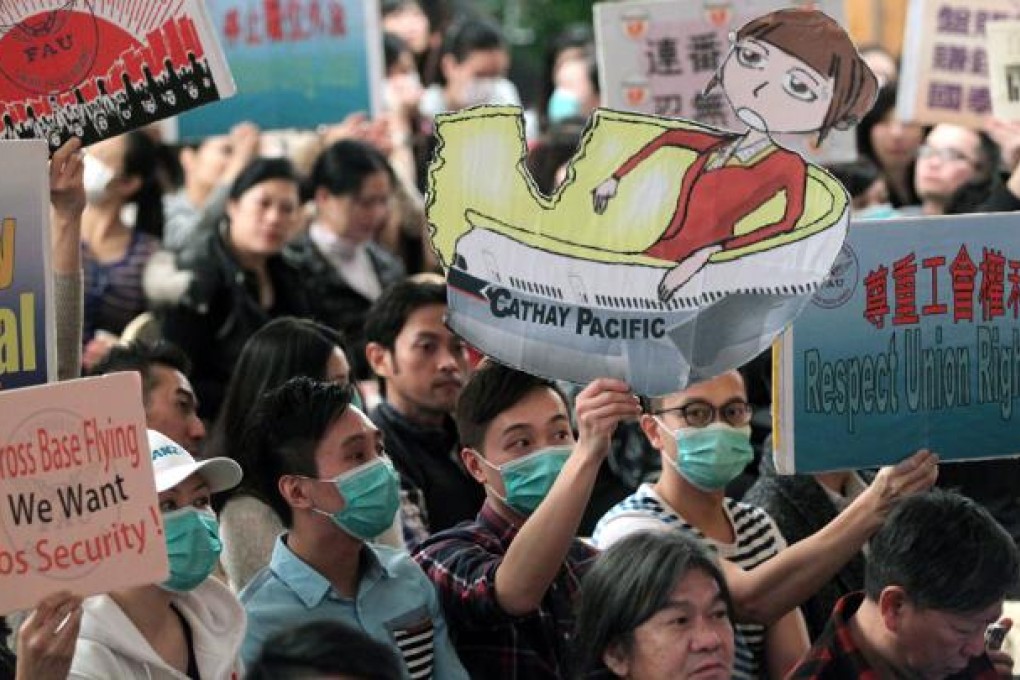 Members of the Cathay Pacific Airways Flight Attendants Union have decided to take industrial action over a pay dispute with the airline. Photo: K. Y. Cheng