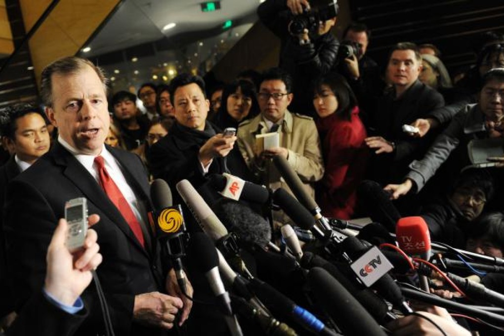 US special envoy Glyn Davies (left) speaks to the media during bilateral talks with North Korea earlier this year. Photo: AFP