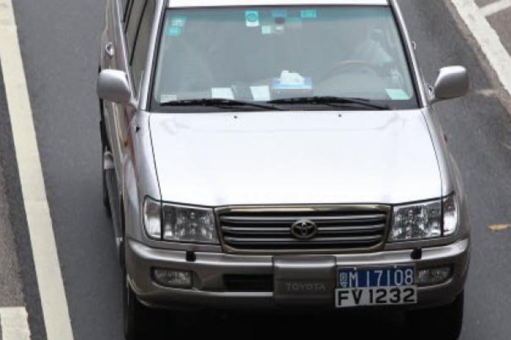 About 2,000 left-hand mainland cars have permits to drive in Hong Kong today under the existing cross-border driving license scheme. Photo: David Wong/SCMP