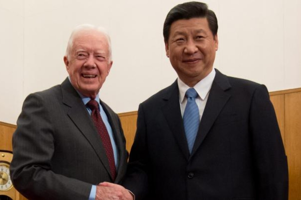 Xi Jinping (right) and Jimmy Carter. Photo: EPA