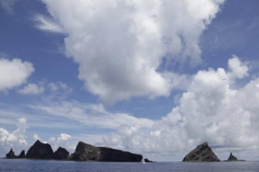 A group of disputed islands known as Senkaku in Japan and Diaoyu in China is seen from the city government of Tokyo's survey vessel in the East China Sea. Photo: Reuters