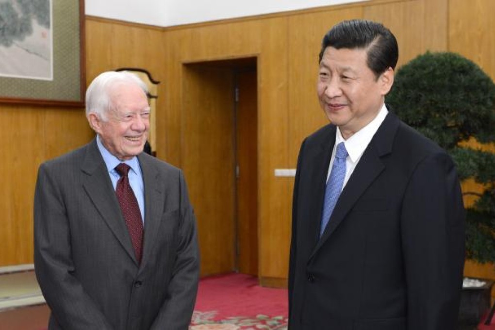 In meeting with Jimmy Carter in Beijing, president-in-waiting Xi Jinping calls for 'new type of bilateral ties' between the world's two biggest economies. Photo: Xinhua