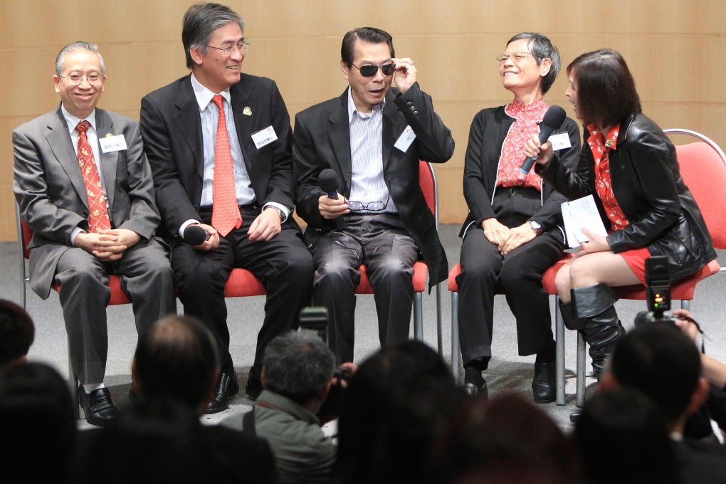 Hong Kong's first heart transplant recipient, Chiu Wan-hoi (centre), at the Academy of Medicine in Aberdeen. Photo: Jonathan Wong