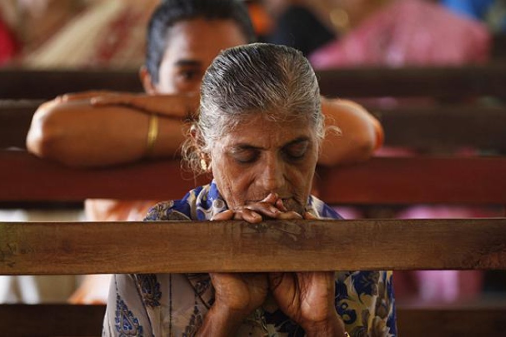 People offer mass prayers at a church in Shirva, north of Mangalore, India, on Saturday. Photo: AP