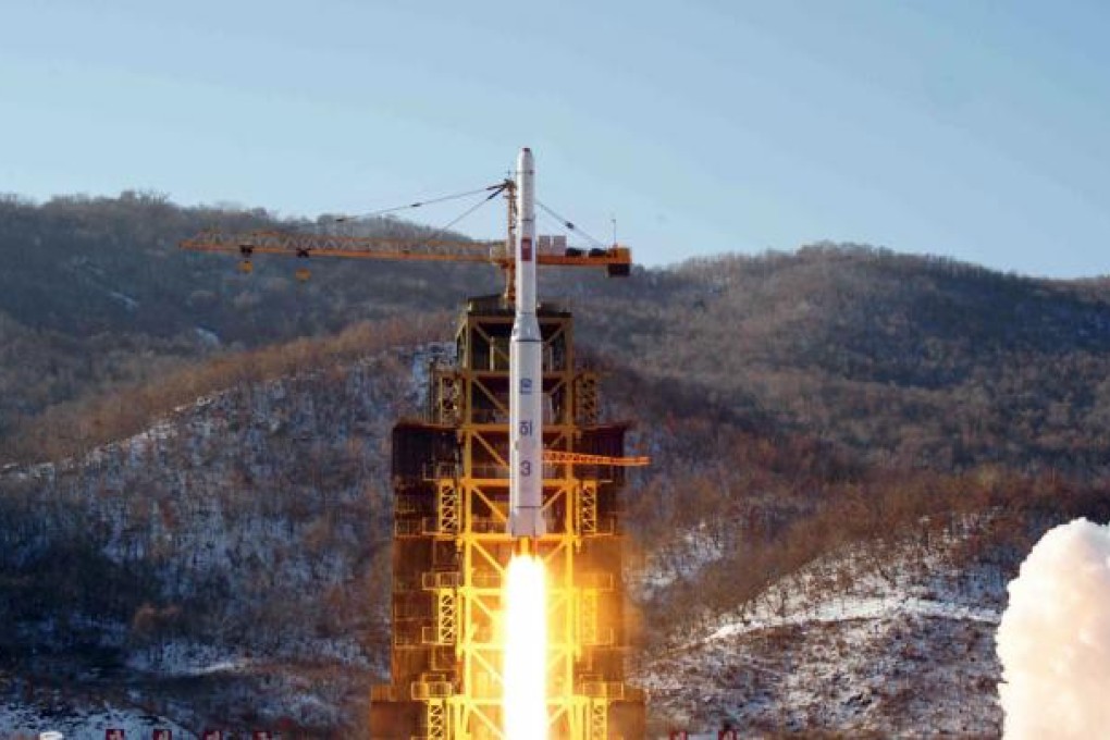 North Korea's Unha-3 rocket lifts off from the Sohae launch pad in Tongchang-ri, North Korea. The satellite that North Korea launched on board the long-range rocket is orbiting normally. Photo: AP