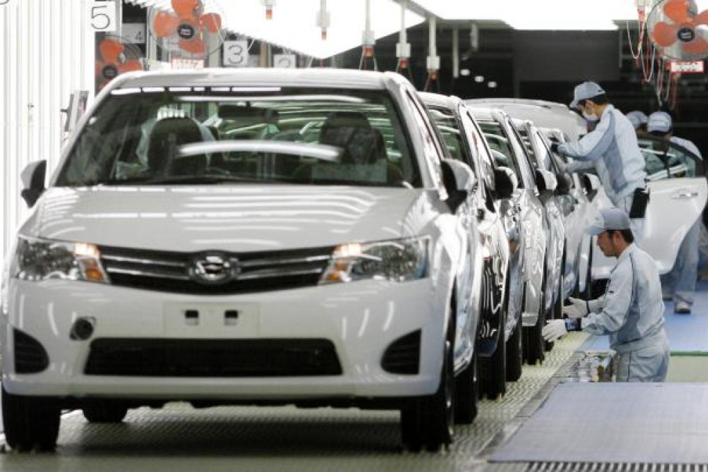 Toyota has increased sales this year after the 2011 tsunami and is on track to be the world's biggest carmaker again. Photo: Bloomberg