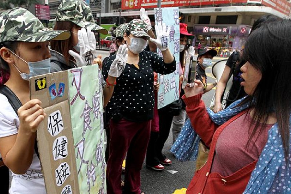 Sex workers' rights group Zi Teng protest in Wan Chai on Monday. Photo: Sam Tsang