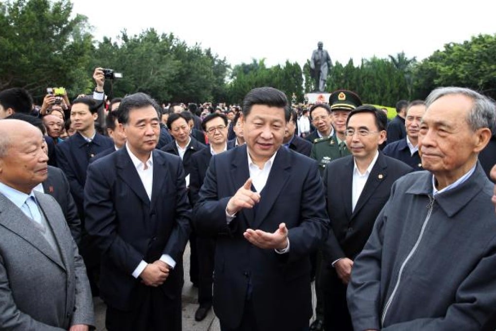 Xi Jinping talks with retired comrades who participated in the construction of Shenzhen Special Economic Zone during his recent visit to Shenzhen. Photo: Xinhua