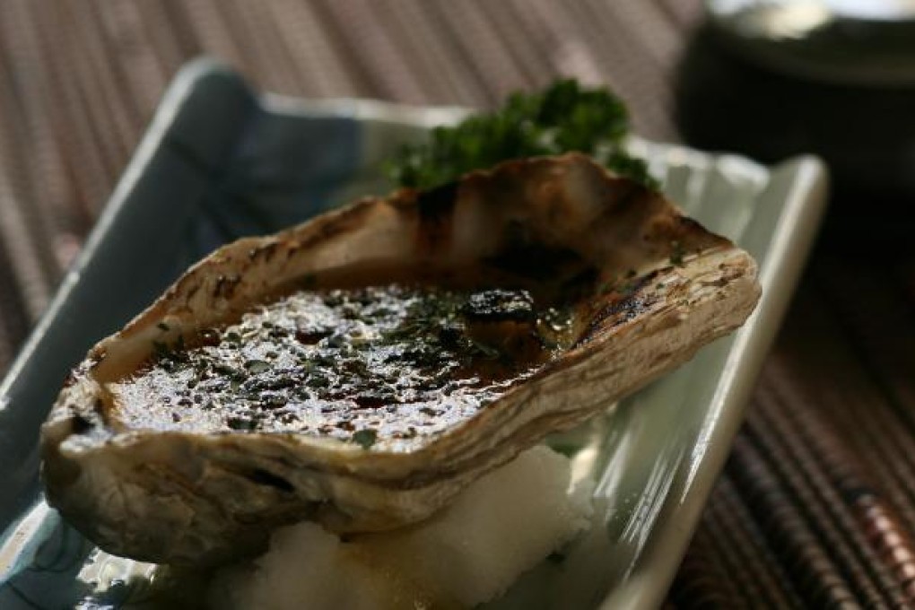 Grilled oysters with kimchi butter