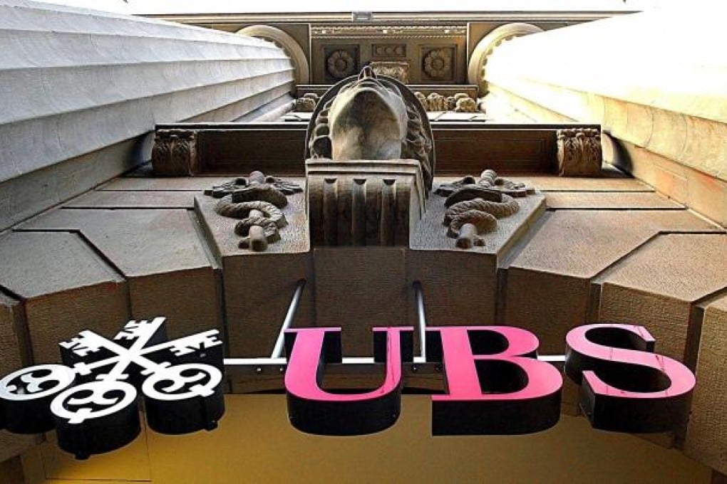 UBS employees paid bribes to rig Libor rates, the FSA said. Photo: AP