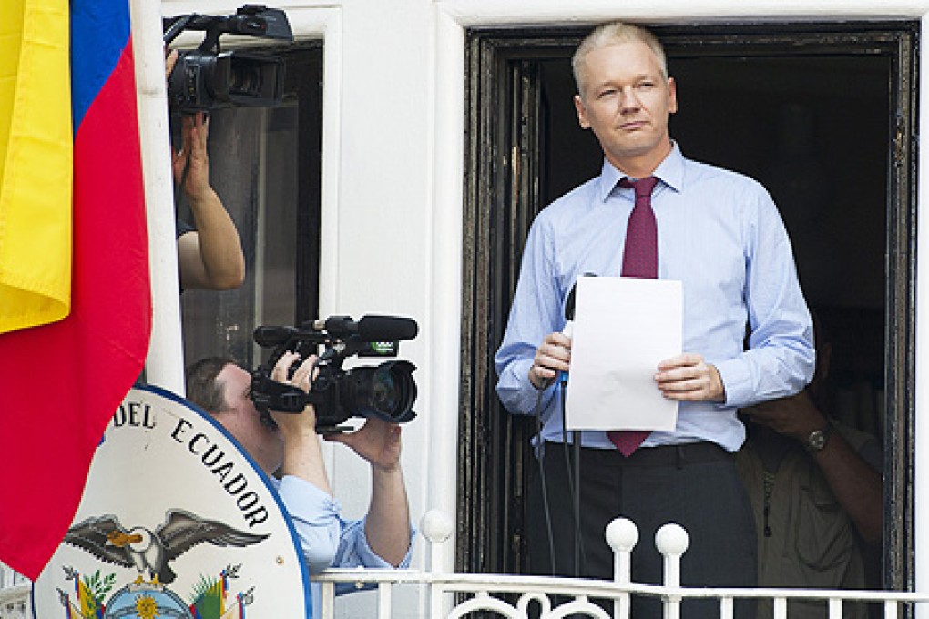 Julian Assange received a rock star welcome when he was last seen by the outside world, addressing supporters from the embassy balcony on August 19. Photo: EPA