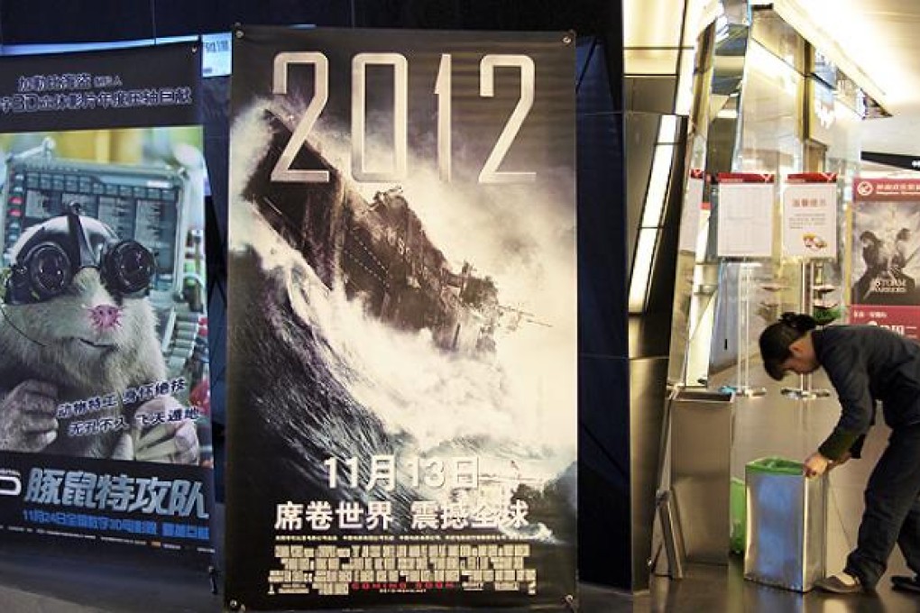 A cinema advertises the film <i>2012</i> in Beijing. Photo: AP