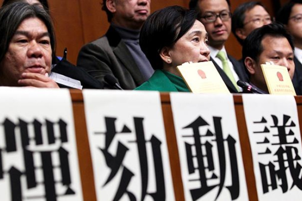 Lawmakers Leung Kwok-hung, Emily Lau Wai-hing and other pan-democratic lawmakers announce they will put forward a motion to impeach Chief Executive CY Leung Chun-ying. Photo: SCMP Pictures