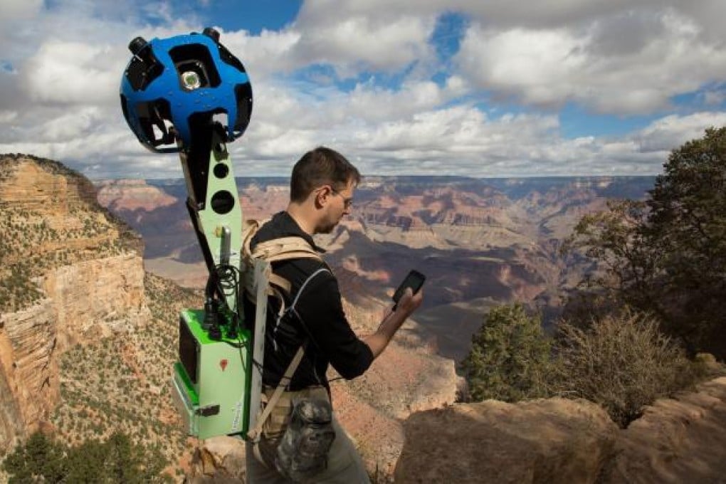 Google product manager Ryan Falor uses an Android device to control the Trekker—a wearable backpack with a camera system on top—to traverse the Grand Canyon. A new report said Google’s online Play shop of applications for smartphones and tablets powered by its operating systems is growing faster than rival Apple. Photo: AFP
