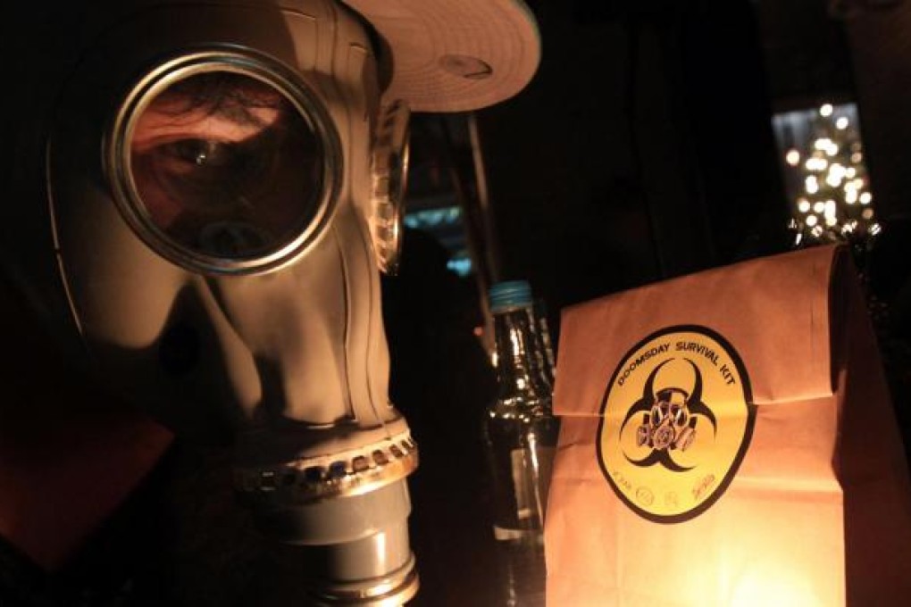 A Lan Kwai Fong reveller dons a gas mask. Photo: Jonathan Wong