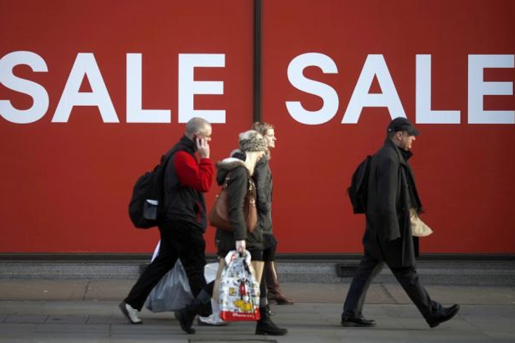 Britain's economy expanded less than previously estimated in the third quarter and the budget deficit unexpectedly widened in November, complicating Prime Minister David Cameron's attempts to bolster the recovery. Photo: Bloomberg