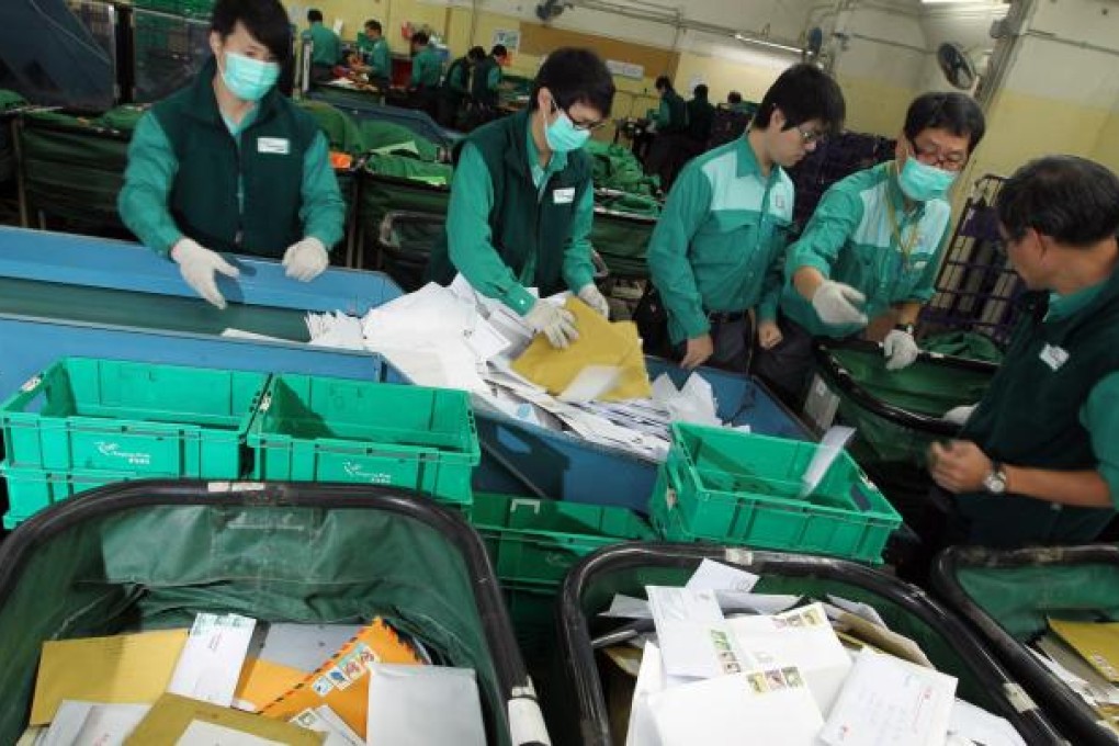 Many of the mail items the Hongkong Post processes every day go through the sorting office at the General Post Office. Photo: May Tse